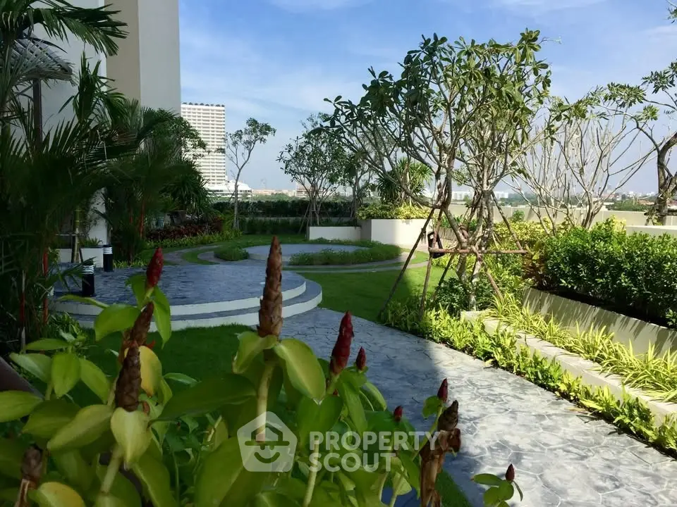 Luxurious garden view with lush greenery and modern landscaping in a high-end residential area.