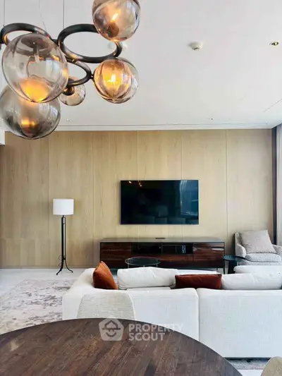 Luxurious living room with modern decor and elegant lighting