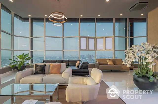 Luxurious living room with panoramic city views and modern furnishings