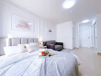 Bright and modern bedroom with stylish decor and cozy ambiance