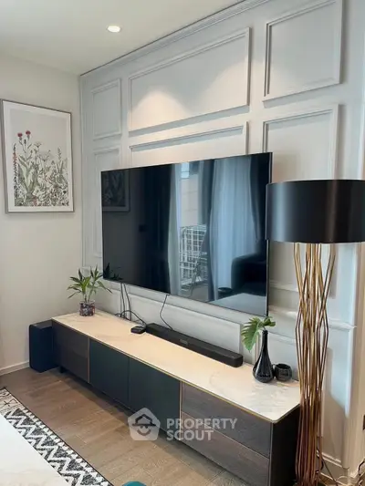 Stylish living room with modern TV setup and elegant decor