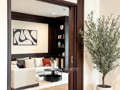 Elegant living room with modern decor and cozy seating area