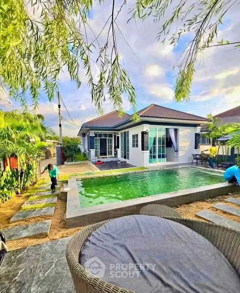 Charming single-story home with private pool and lush garden, perfect for relaxation and outdoor entertaining.