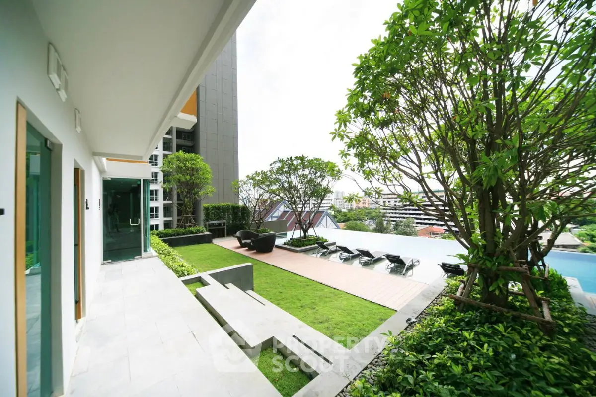 Luxurious rooftop garden with infinity pool and stunning city view
