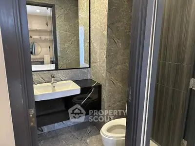 Modern bathroom with sleek design and marble finishes