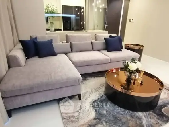 Luxurious modern living room with plush sectional sofa and elegant decor
