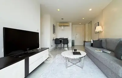 Modern living room with sleek furniture and a cozy ambiance