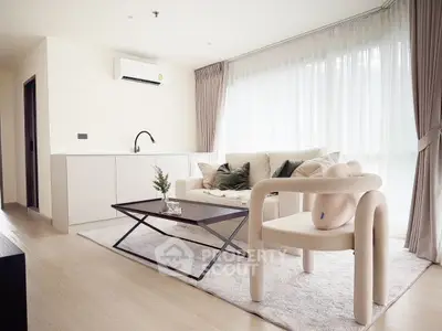 Modern living room with elegant furniture and natural light