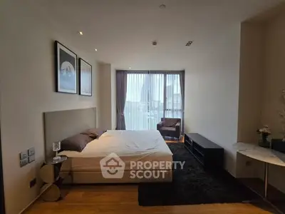 Modern bedroom with large window and stylish decor