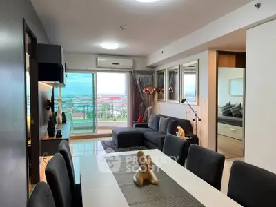 Modern living room with open layout and stunning city view from balcony.