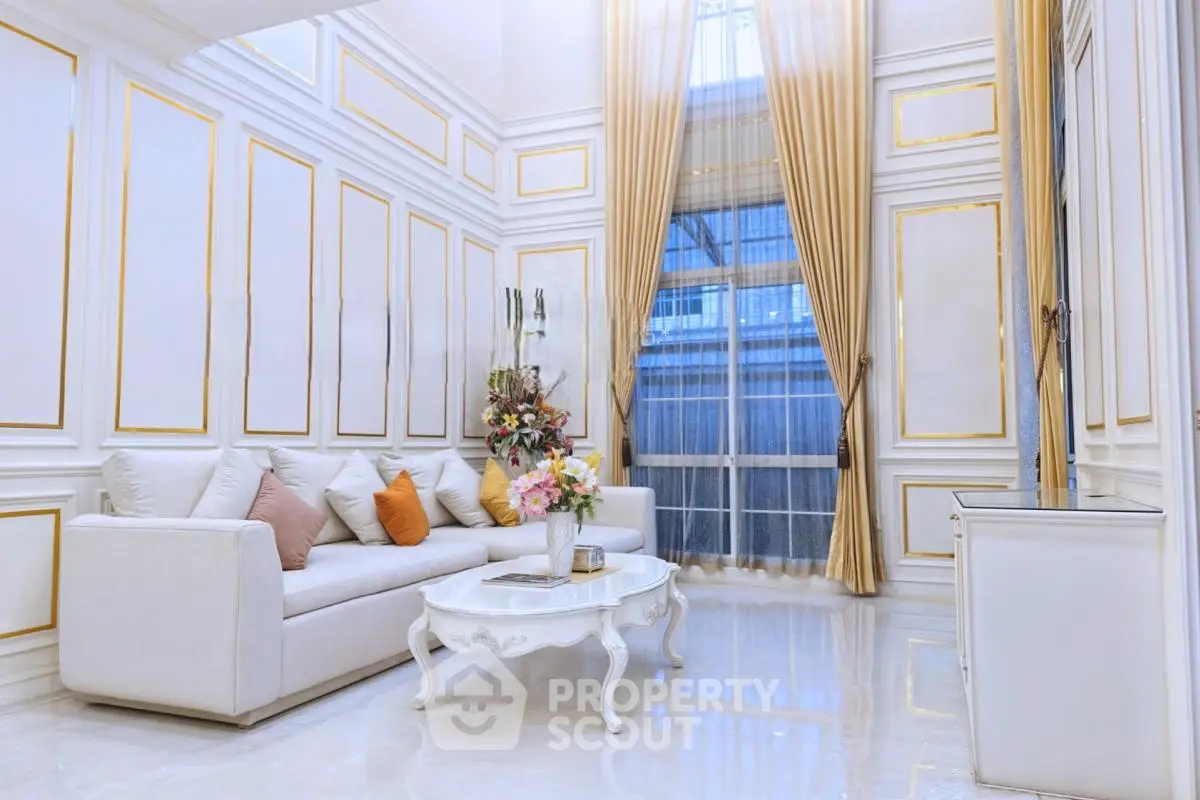 Luxurious living room with elegant decor and high ceilings