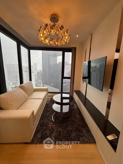 Luxurious living room with panoramic city views and elegant chandelier