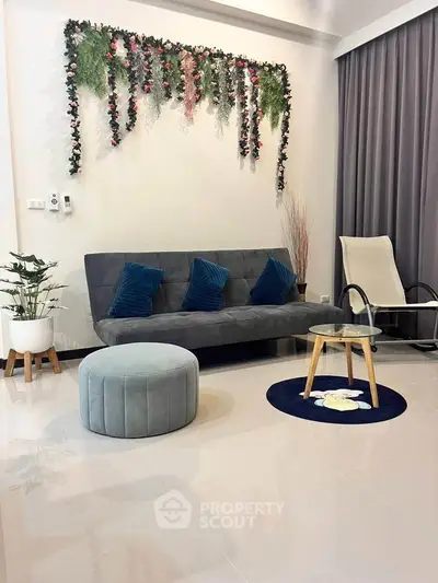 Stylish living room with modern decor and plush seating