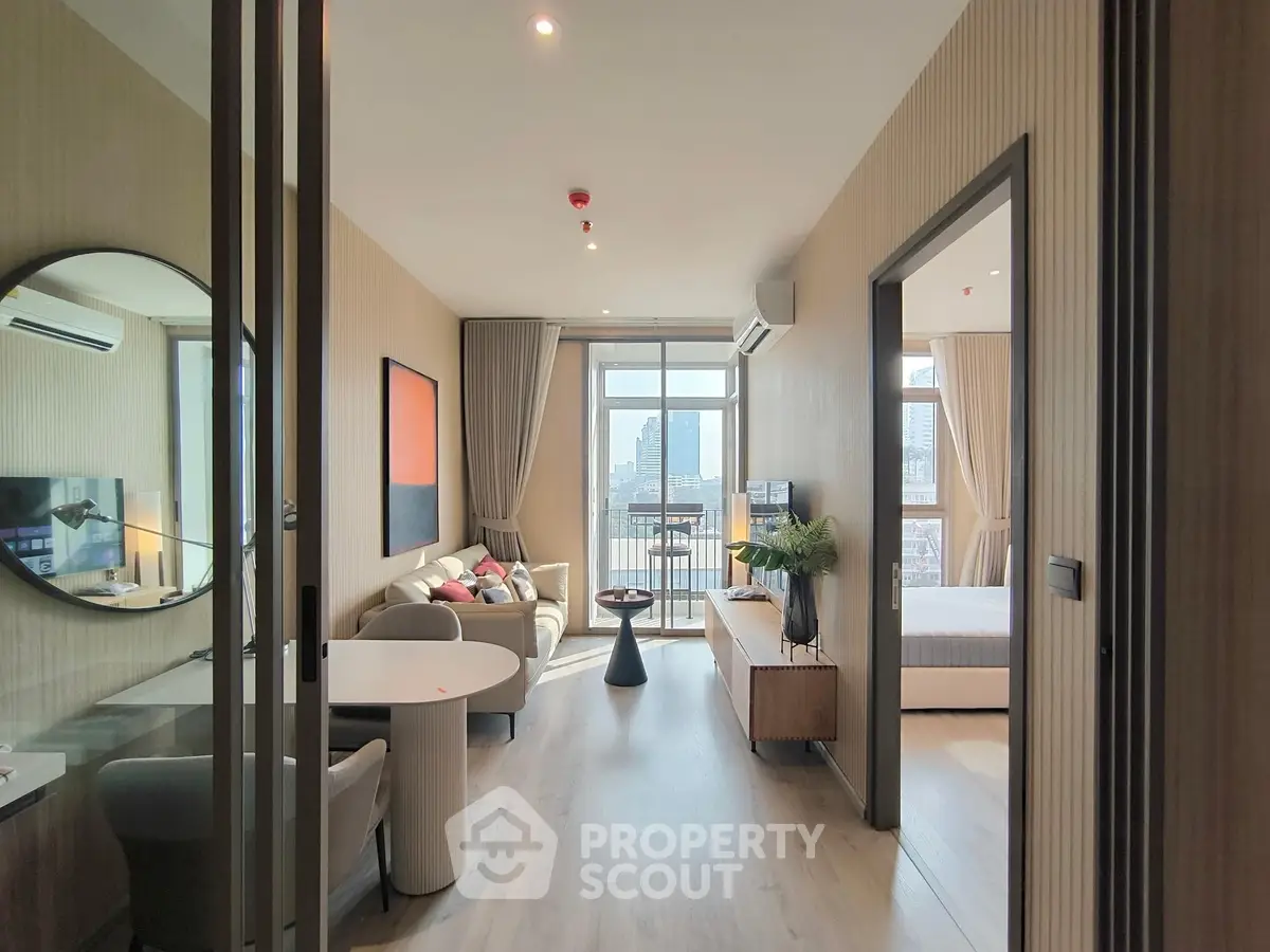 Modern apartment interior with open living room and city view balcony