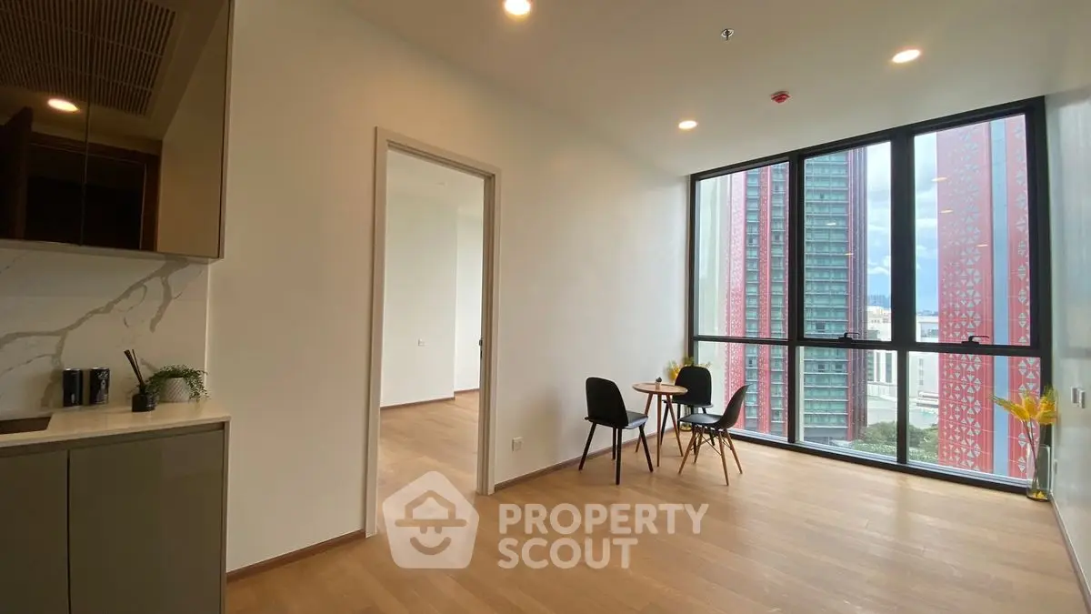 Modern apartment with open layout and floor-to-ceiling windows