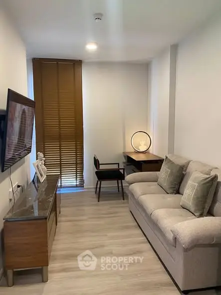 Cozy living room with modern decor and comfortable seating