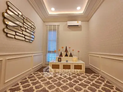 Elegant living room with modern decor and stylish wall mirror