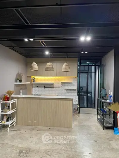 Modern kitchen with open layout and stylish lighting