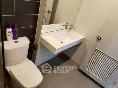 Modern bathroom with sleek fixtures and stylish tile design
