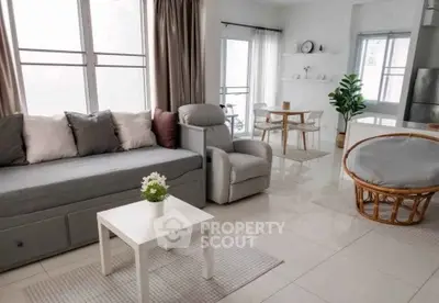 Modern living room with stylish furniture and natural light