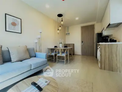 Modern living room with stylish decor and dining area