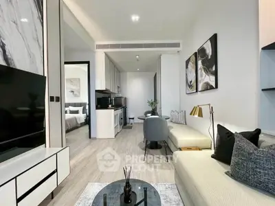 Modern open-plan living room with stylish decor and natural light