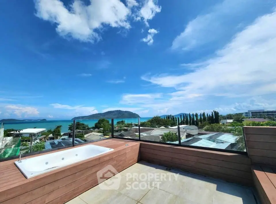 Stunning rooftop terrace with ocean view and jacuzzi, perfect for relaxation and luxury living.