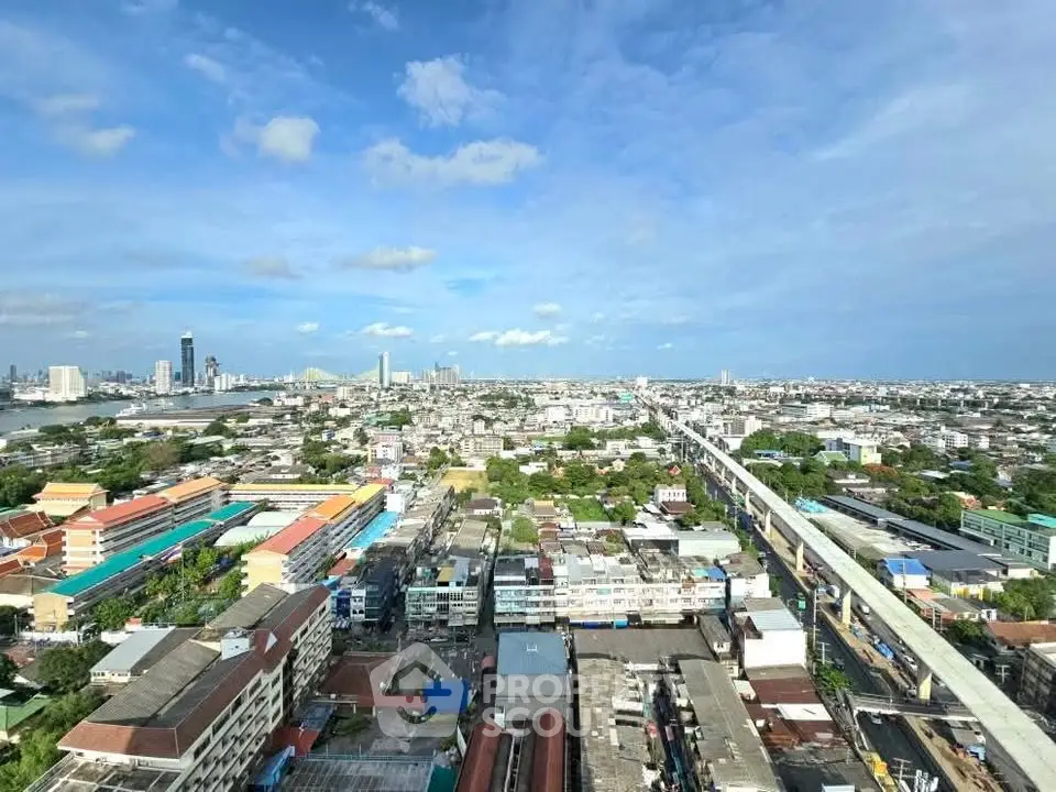 Stunning cityscape view from high-rise building with clear blue sky
