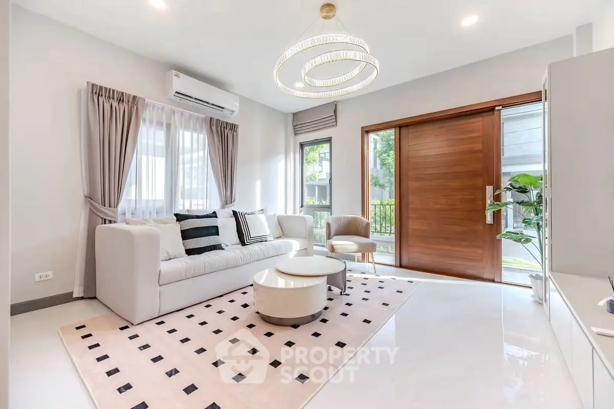 Elegant living room with modern decor and natural light