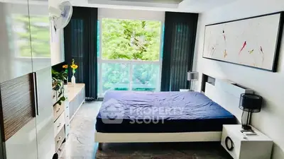 Modern bedroom with large window and stylish decor