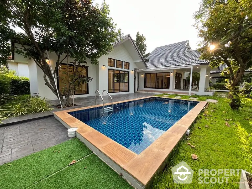 Stunning modern home with private pool and lush garden, perfect for luxury living.