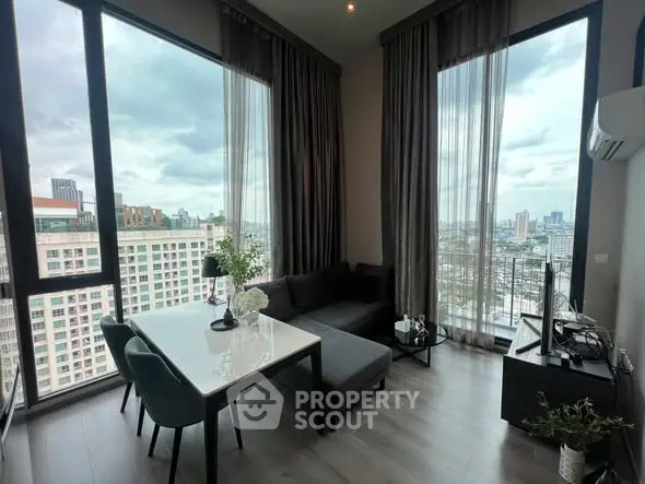 Modern living room with panoramic city view and elegant decor