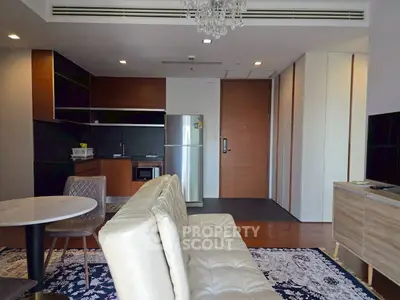 Modern living room with open kitchen and stylish decor