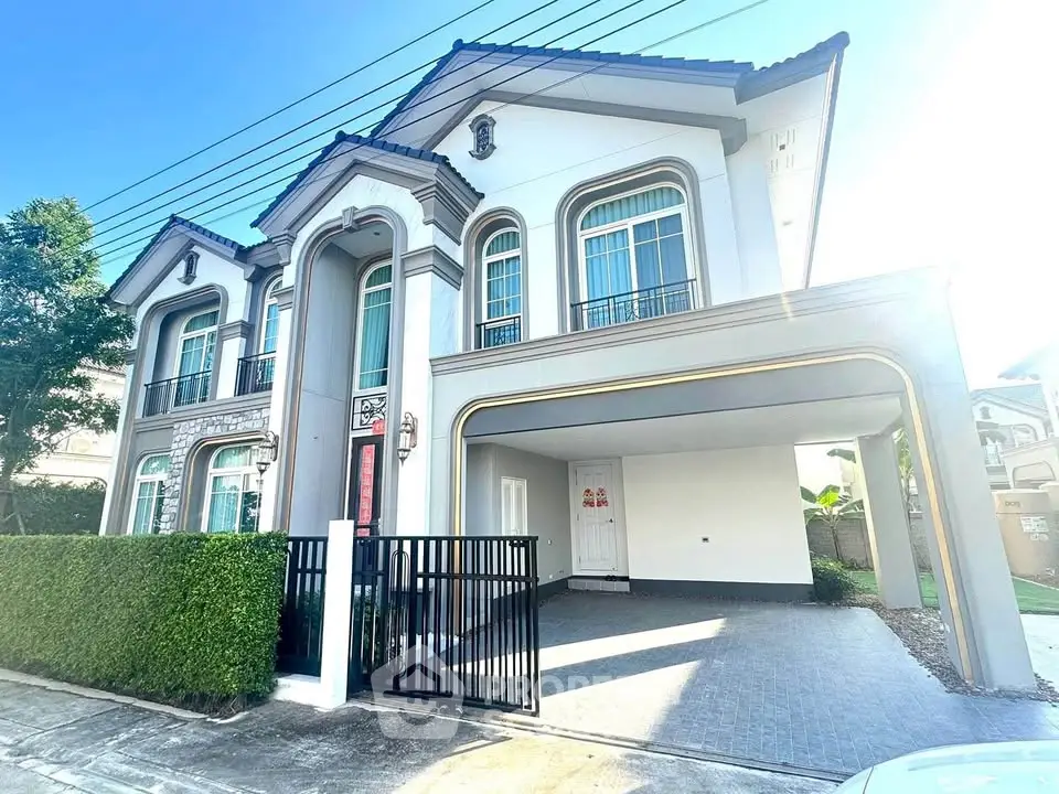 Elegant two-story house with modern design and spacious driveway