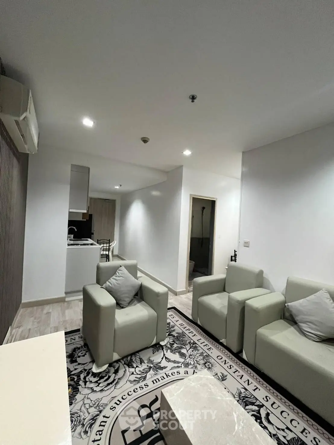 Modern living room with stylish furniture and open layout, perfect for relaxation and entertaining.