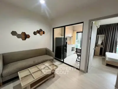 Modern apartment interior with cozy living room and sleek kitchen design