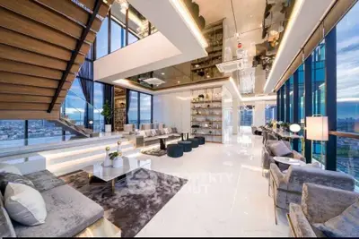 Luxurious modern living room with stunning city views and elegant interior design.