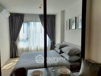 Modern bedroom with elegant decor and natural light