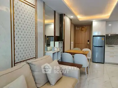 Modern living room with stylish decor and open kitchen layout