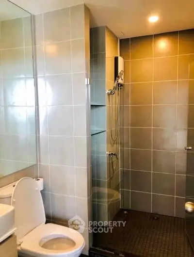 Modern bathroom with sleek shower and elegant tile design