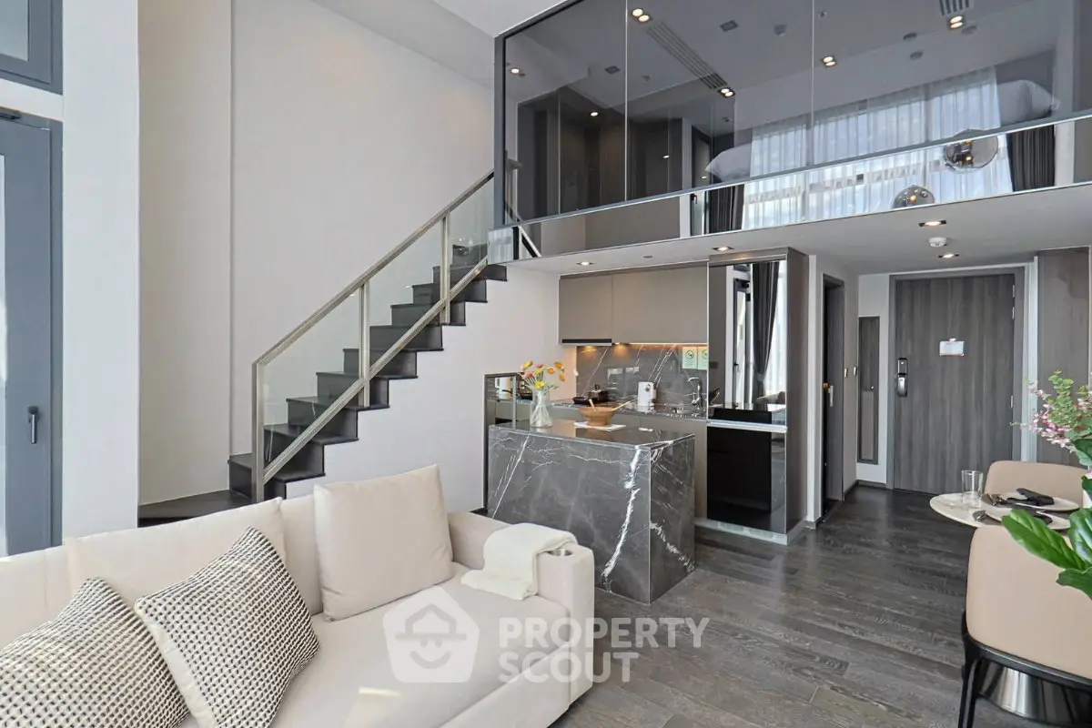 Modern duplex apartment with sleek kitchen and stylish living area