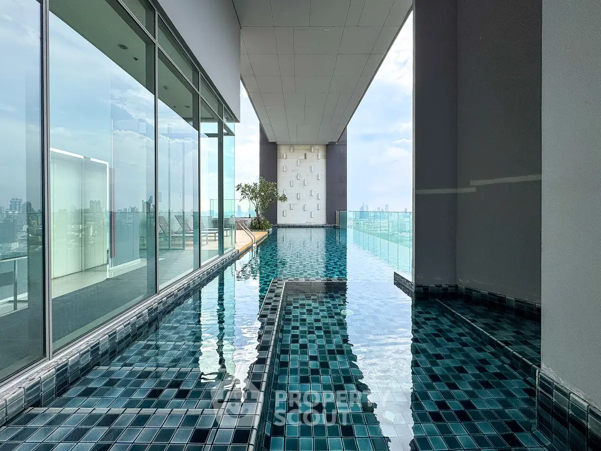 Luxurious rooftop infinity pool with stunning city views and modern design.
