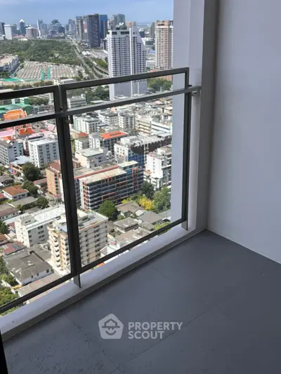 Stunning high-rise balcony with panoramic city views, perfect for urban living enthusiasts.