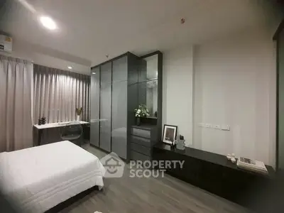 Modern bedroom with sleek furniture and ambient lighting