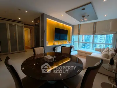 Luxurious modern living room with city view, elegant dining area, and stylish decor.