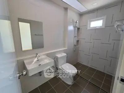 Modern bathroom with sleek fixtures and natural light