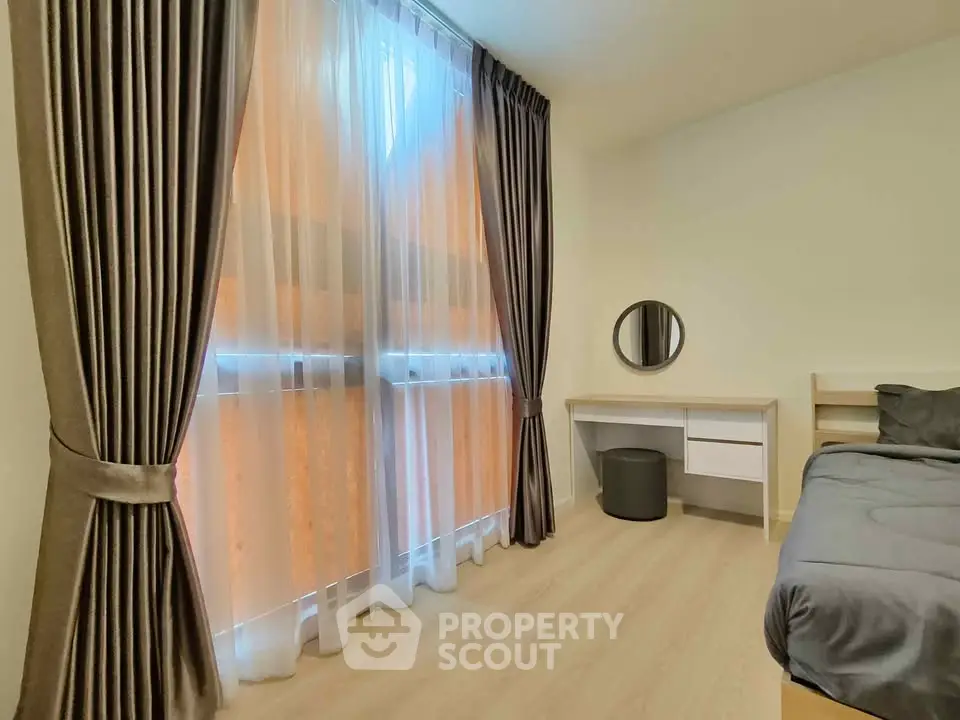 Cozy bedroom with modern decor and natural light