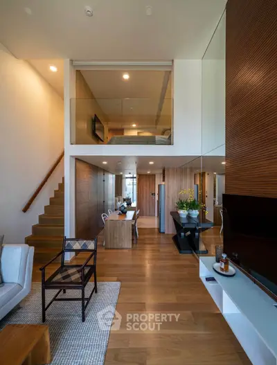 Modern duplex living room with high ceilings and stylish decor