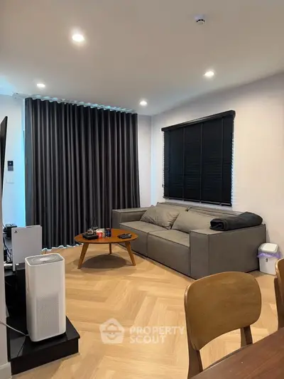 Modern living room with sleek furniture and stylish decor