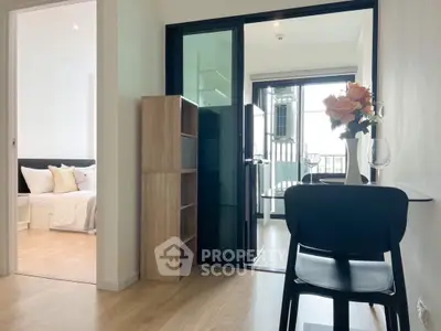 Modern apartment interior with open layout and balcony view